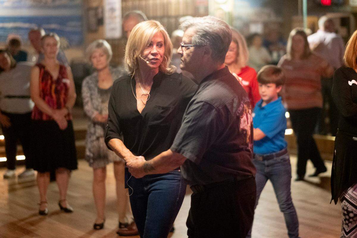 Dance instructor Jackie McGee gives Monday night dance lessons at Fat Harold’s, one of North Myrtle Beach’s traditional shag dance clubs. Nov. 6, 2023.