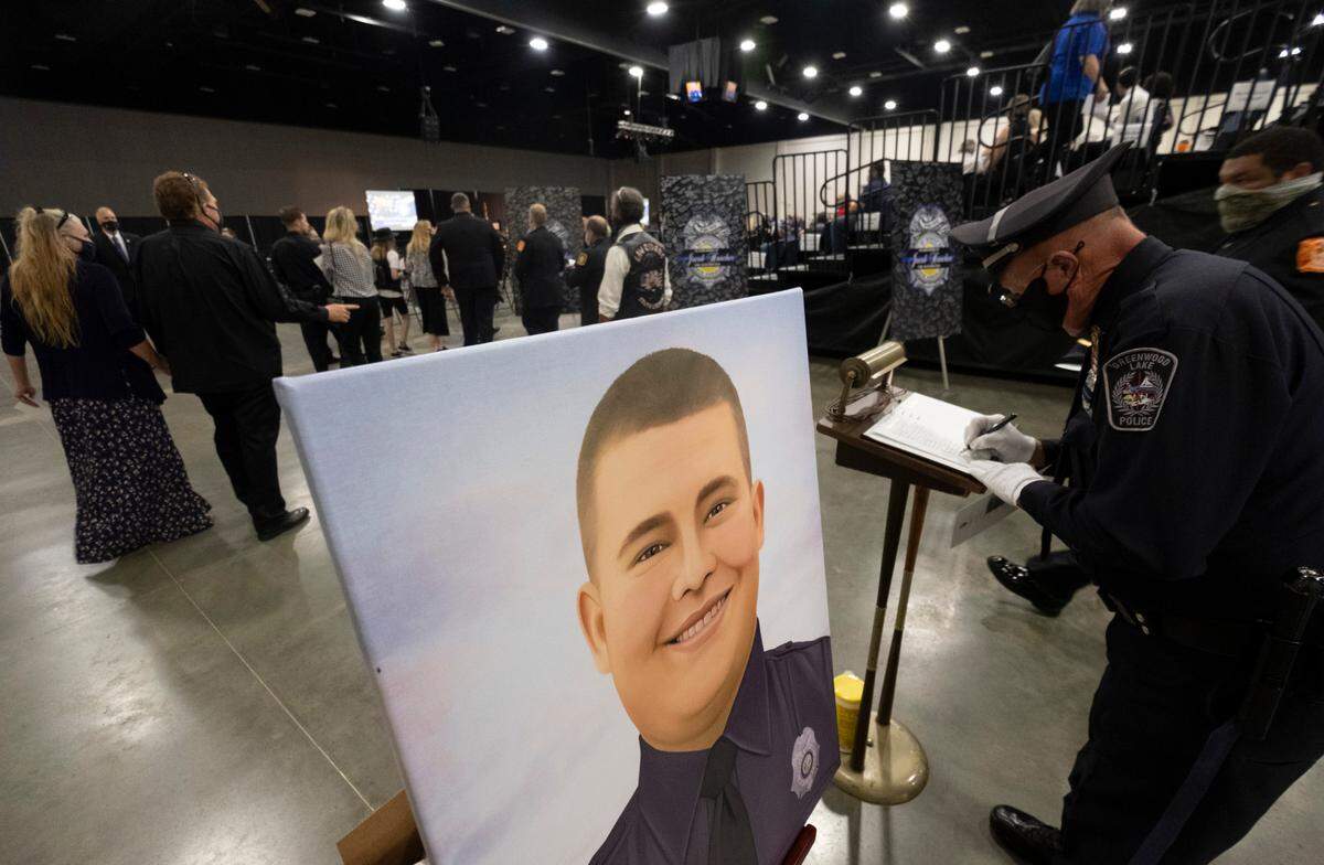 A public funeral service is being held today at the Myrtle Beach Convention Center for Pfc. Jacob Hancher, a Myrtle Beach police officer who was shot and killed earlier this week while responding to a domestic call. Police and first responders from around the region came to pay their respects. October 9, 2020.