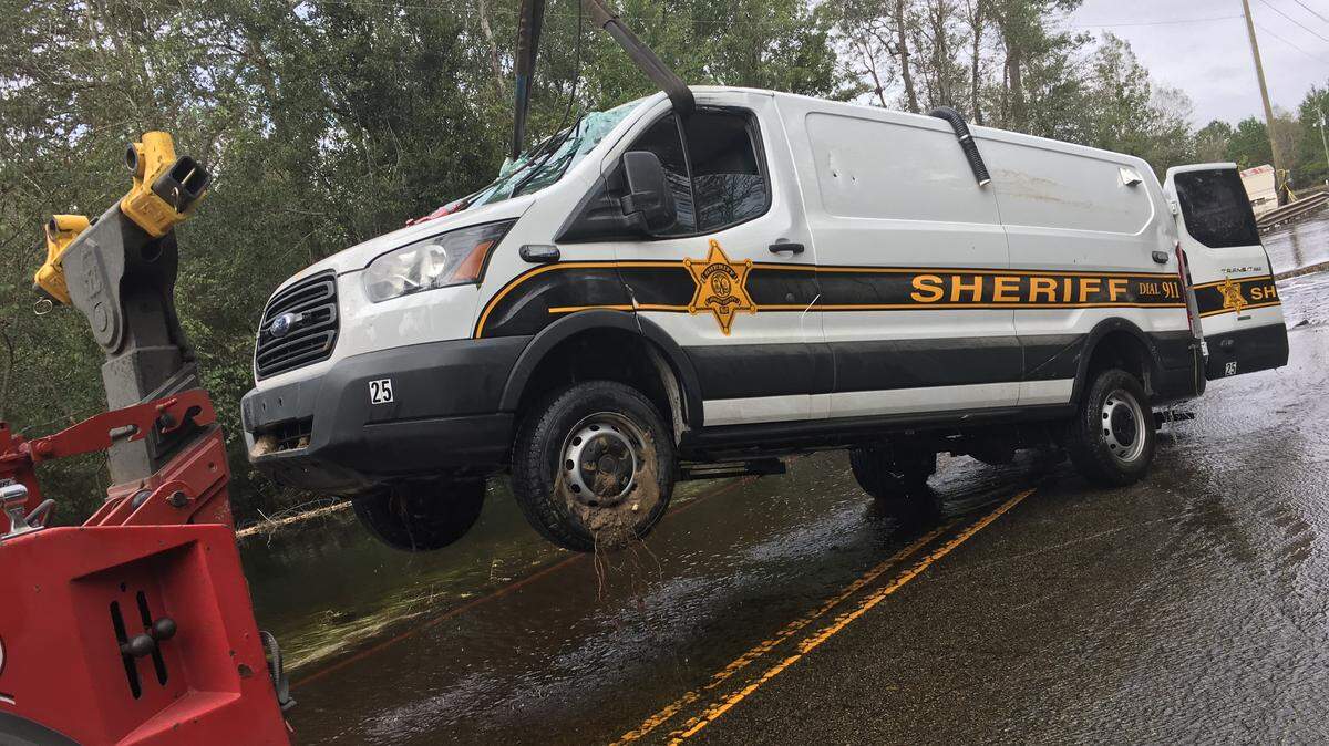 The Horry County Sheriff’s Office transport van is removed from the scene about a week after it drove into floodwaters outside of Nichols. Two mental health patients drowned in the back and the deputies in charge of their safety were charged with manslaughter.