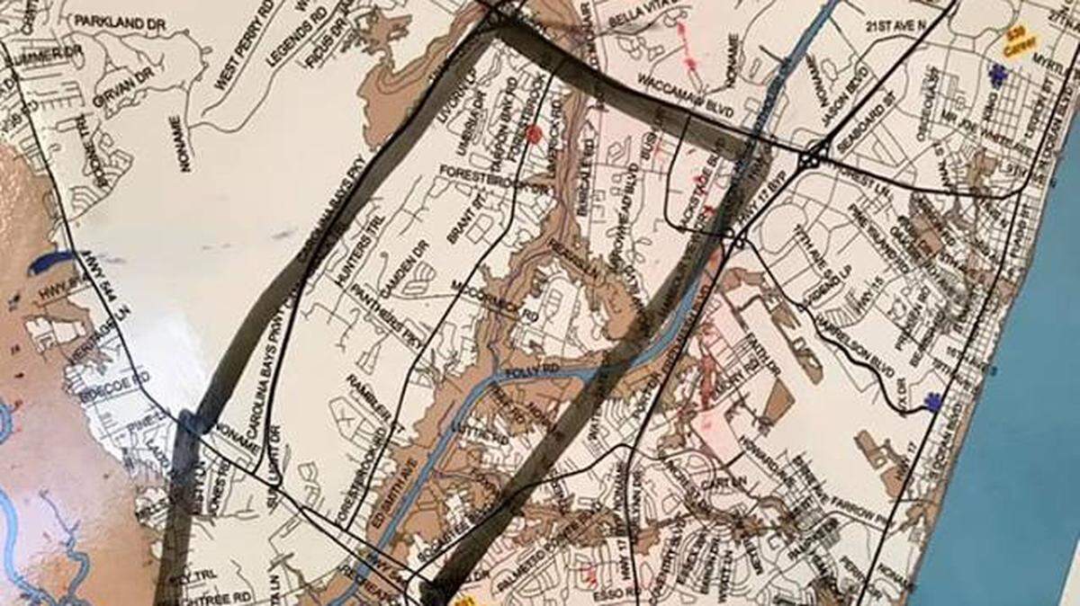 Officials urge residents in the areas enclosed on the map to consider evacuating because of a flood threat.
