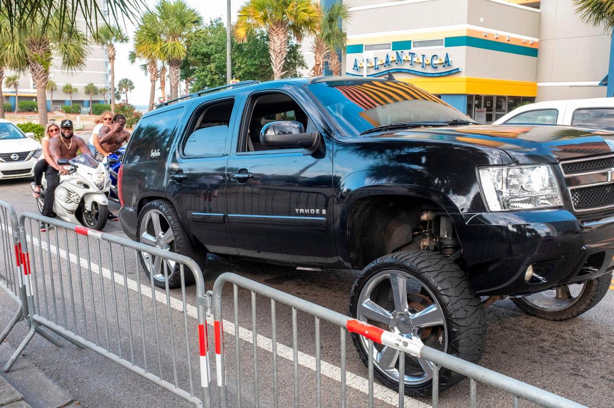 A modified truck cruises Ocean Boulevard in Myrtle Beach during Memorial Day weekend 2021. May 29, 2021. The S.C. legislature is considering a ban on the lifting of vehicle’s front ends more than four inches above the rear commonly known as the “Carolina Squat.”