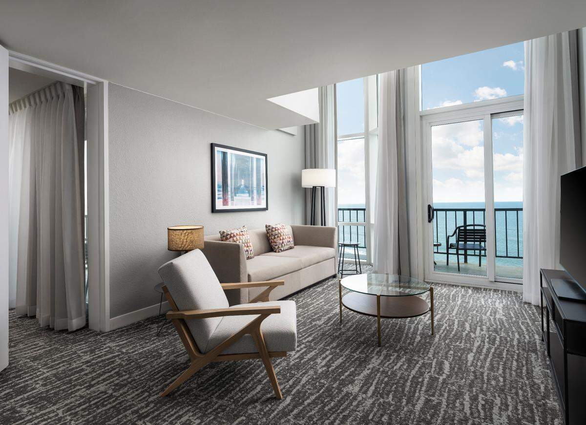 A newly upgraded living area in a suite at the Kingston Hilton resorts in Arcadian Shores.