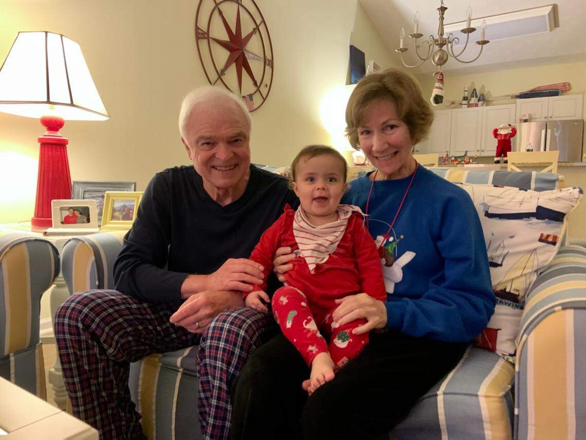 Former NASA astronaut Michael “Rich” Clifford (left) with his wife Nancy and granddaughter, Eva, named after his 1996 spacewalk, known as extra vehicular activity. Clifford, living in North Myrtle Beach, died Tuesday, Dec. 28, 2021.