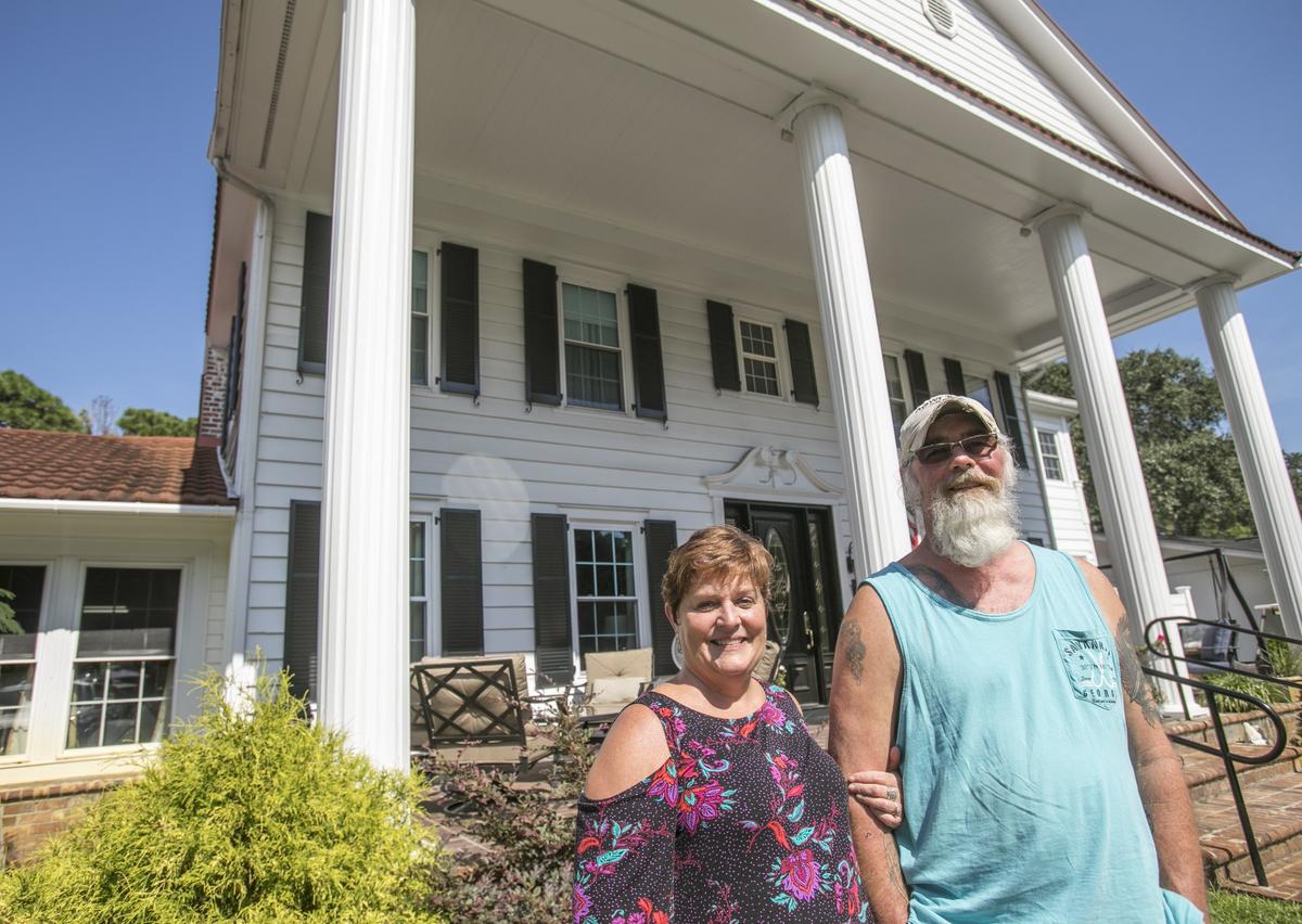 Jim and Susan Lynch stand outside their historic home at 402 Calhoun Road. The couple have proposed special zoning of a Bed & Breakfast “overlay district” to the Myrtle Beach City Council.Aug., 9 2018.