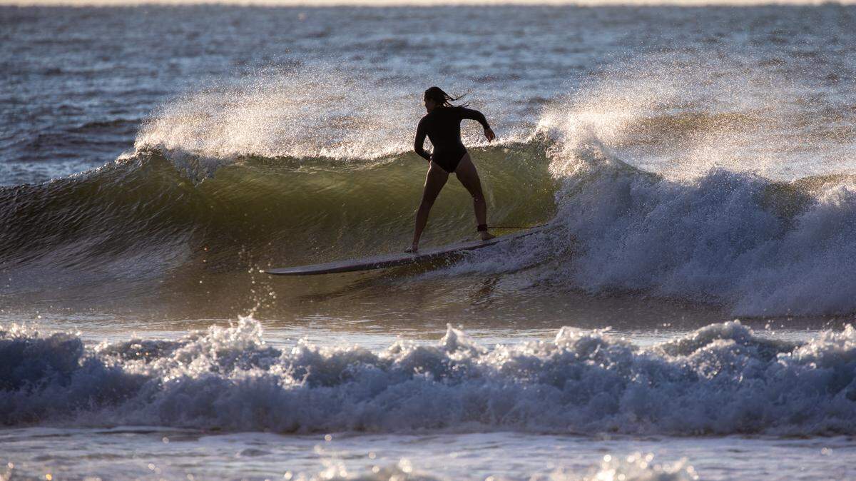 Surfers near Cherry Grove Pier in North Myrtle Beach, S.C. enjoyed the waves created by Hurricane Lee’s passage off the Carolina coastline. Sept. 15, 2023.