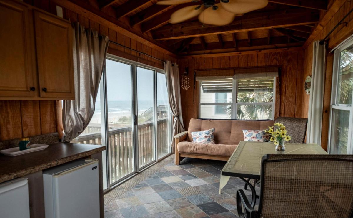 A pair of beach cabanas, two of only about 15 on this unique stretch of Myrtle Beach’s oceanfront know as the cabana section, are currently up for sale. The units are connected by an elevated boardwalk that leads to the Atlantic Ocean. While not for occupancy, owners enjoy a place of refuge on beach days. July 19, 2023.