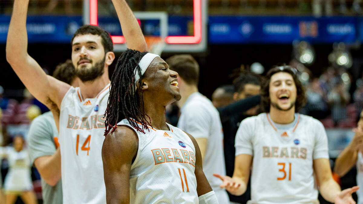 Mercer celebrates after defeating Western Carolina 81-53 Friday night in the SoCon Ingles Basketball Championships at the Harrah’s Cherokee Center in Asheville, N.C.