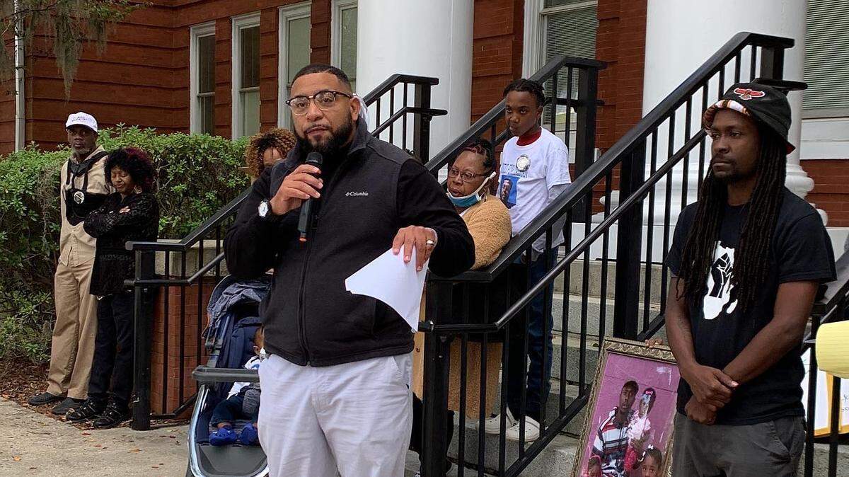 Dameion Fowler (center) speaks in October 2021 in front of Conway courthouse for a rally seeking justice for Tristan Vereen, an Horry County man shot and killed September 2021 by a South Carolina Highway patrol officer. Fowler, of Loris, was a longtime racial and social justice activist who died Feb. 4, 2022 after he was hit by a vehicle while riding his bicycle.