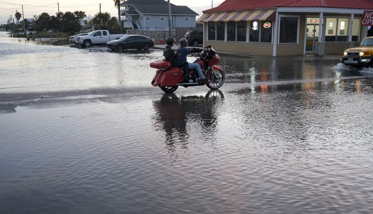 High tide flooding covered Atlantic Avenue in Garden City in salt water on Friday, October 3, 2025.