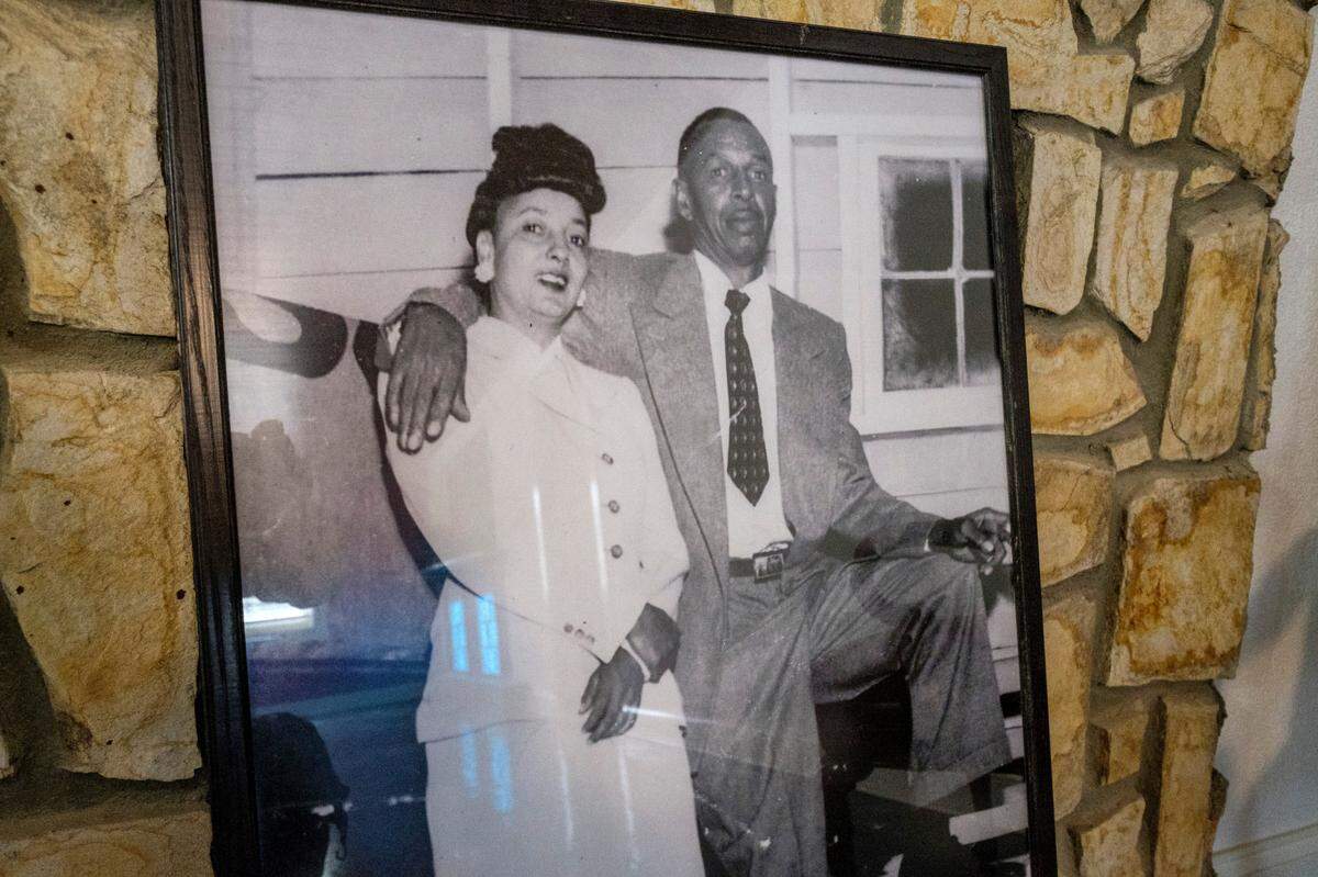 A framed photo of Charlie Fitzgerald and his wife Sarah inside their ols home that has been renovated by the city.