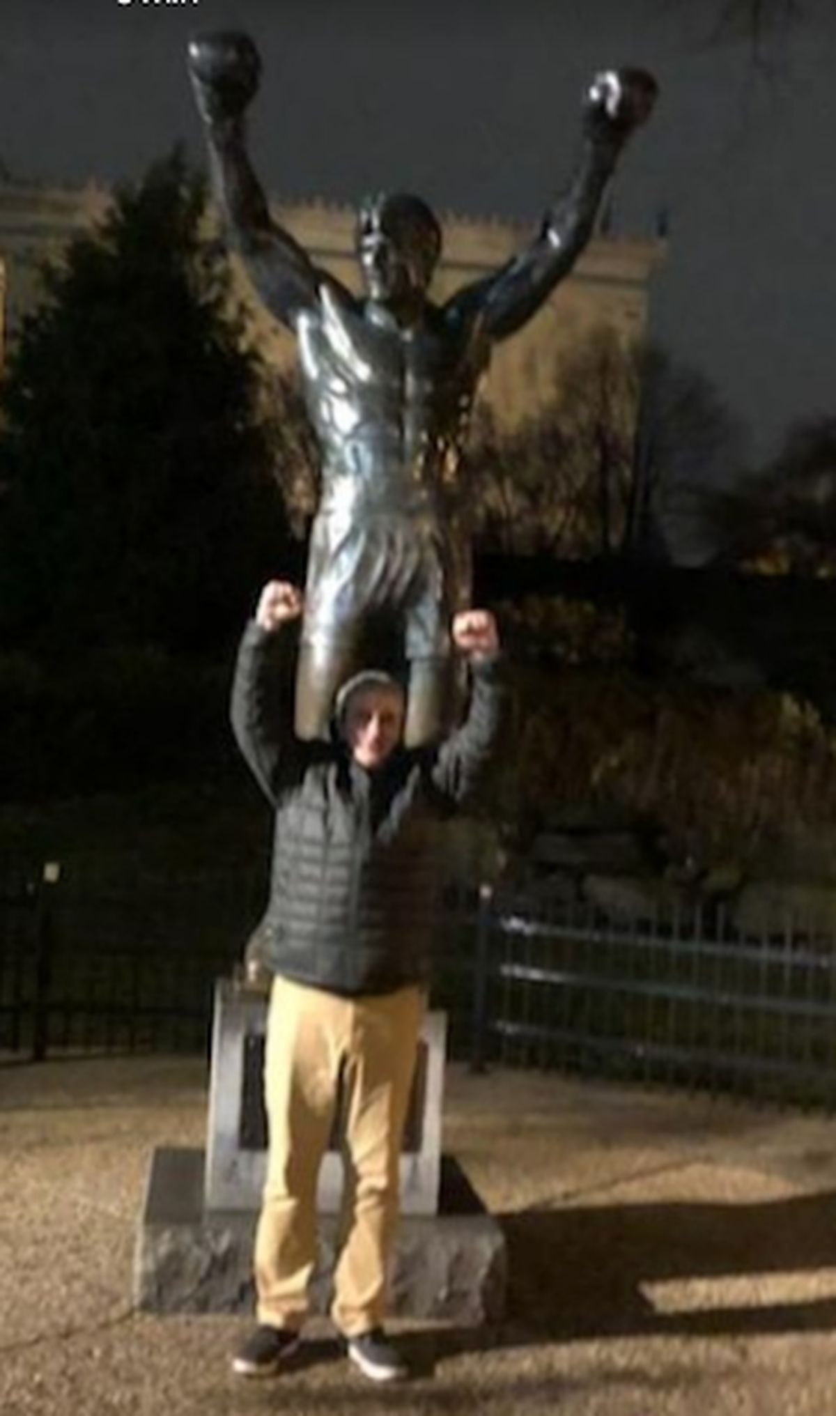 Gary Bennett outside of a “Rocky” movie statue in Philadelphia in 2020.