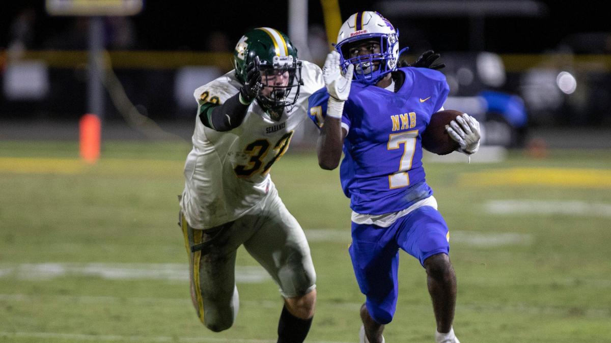 North Myrtle Beach’s Nyliek Livingston breaks away from Myrtle Beach defenders. North Myrtle Beach topped rival Myrtle Beach 34-6 in North Myrtle Beach on Friday night. November 6, 2020.