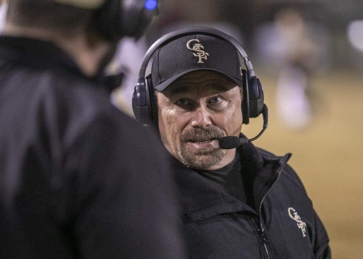 Green Sea Floyds head coach Donnie Kiefer calls plays from the sideline during the third round of the Class A playoffs against C.E. Murray on Friday, November 22, 2019.