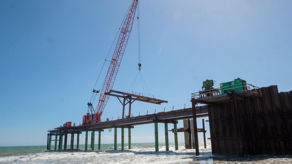 A new concrete pier is being constructed on Surfside Beach to replace the wooden pier that was destroyed by Hurricane Matthew five years ago. Officials expect that the new pier will reopen by Fall 2022. March 07, 2022.
