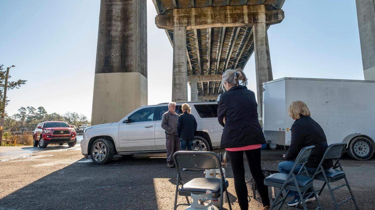Family and friends of Tyler Doyle gathered around heaters to await any updates in the search for the missing duck hunter at the T.Craig Campbell Boating Facility in Little River S.C. This is the eleventh day of searching for the duck hunter after his boat took on water while hunting near the Little River jetties. February 6, 2023.