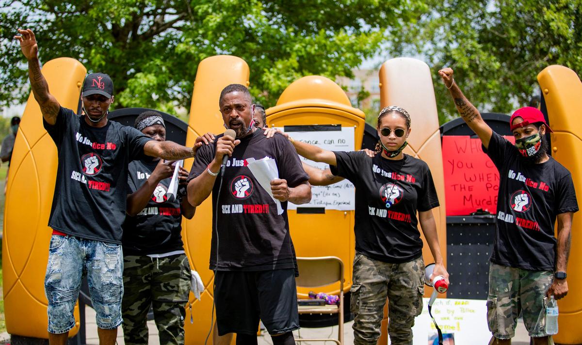 Georgetown resident Sheldon Butts speaks during a Black Lives Matter rally Grand Park at Market Common Sunday afternoon.