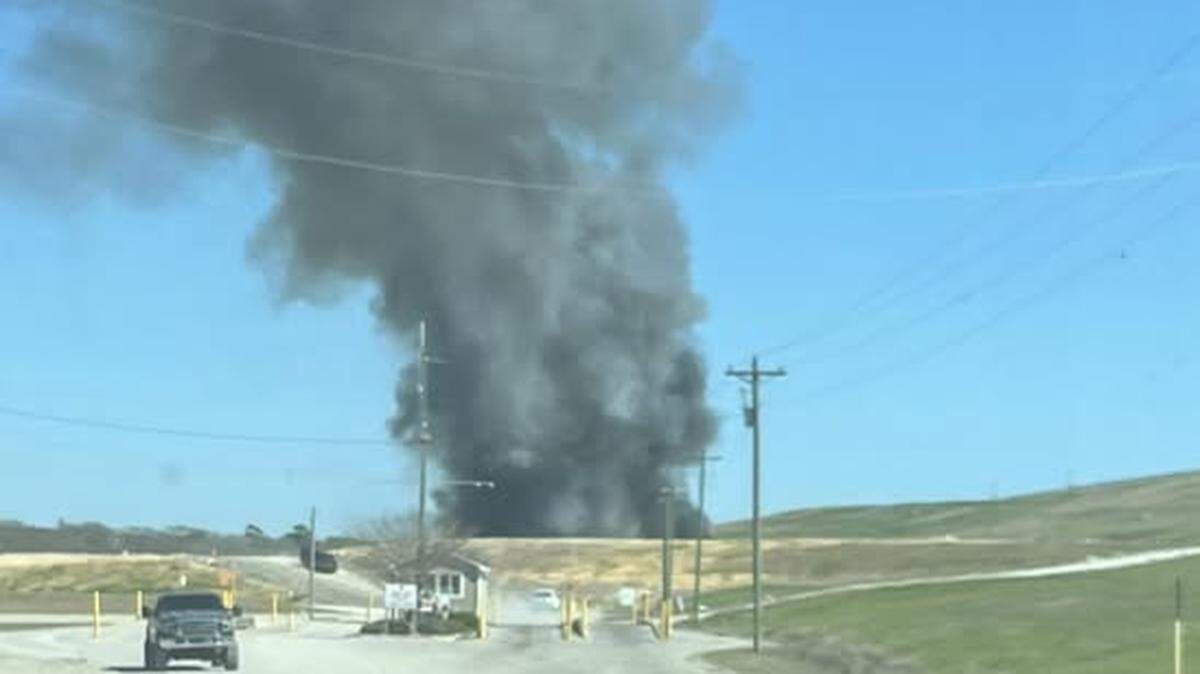A debris fire outside Myrtle Beach, SC created a large plume of smoke Sunday afternoon. Horry County Fire Rescue and the Conway Fire Department have the fire fully contained.