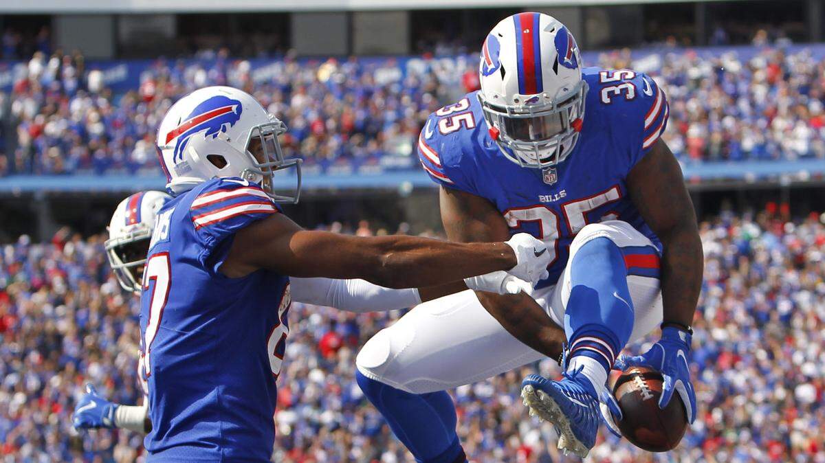 Buffalo Bills' Mike Tolbert (35) celebrates with teammate Jordan Matthews (87) after scoring a touchdown during the second half of an NFL football game against the New York Jets, Sunday, Sept. 10, 2017, in Orchard Park, N.Y.