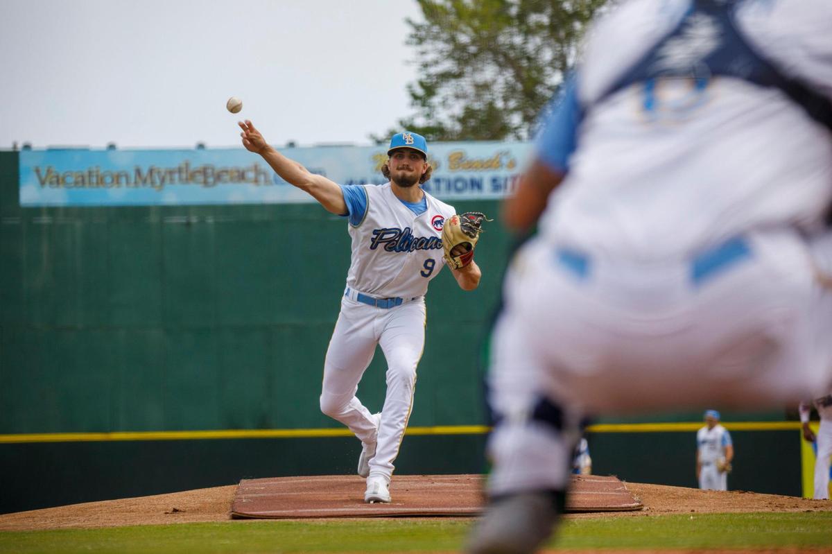 Myrtle Beach Pelicans pitcher Porter Hodge, who started Tuesday night’s home opener, warms up at practice on April 05, 2022.