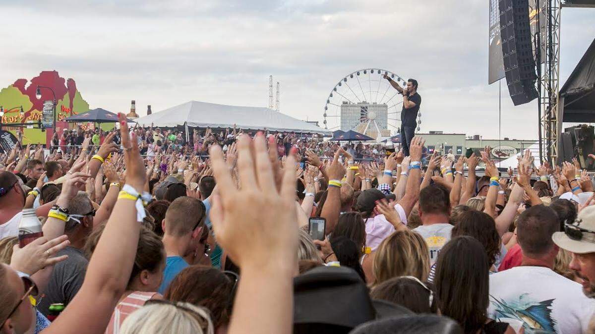 Joe Nichols performs on stage at ocean front in Myrtle Beach for The Carolina Country Music Fest 2016 on Friday in Myrtle Beach. Friday’s festival included crowds of thousands from around the country with games, food, vendors and performances major country artists.
