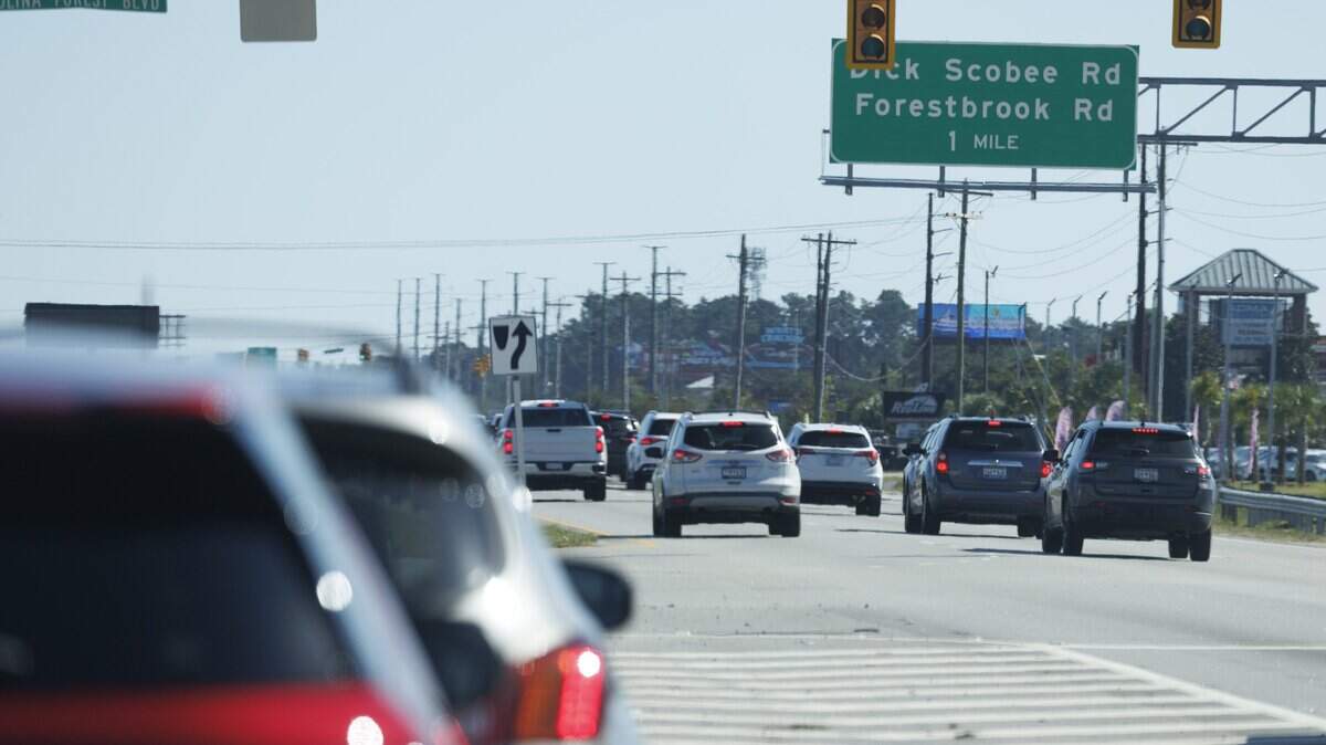 Traffic waits on the light at Carolina Forest Boulevard near Myrtle Beach, SC. Thursday, Oct.16, 2025.