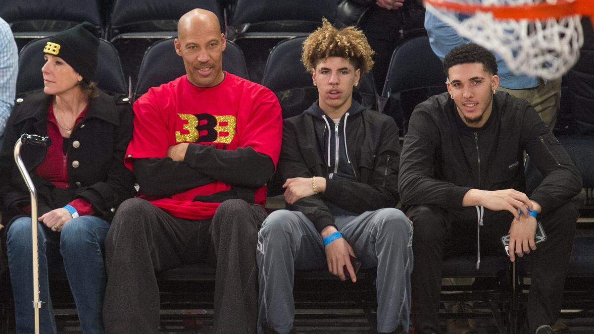 From left, Tina Ball, LaVar Ball, LaMelo Ball and LiAngelo Ball look on as the New York Knicks welcome the Los Angeles Lakers to Madison Square Garden in New York on December 12, 2017.