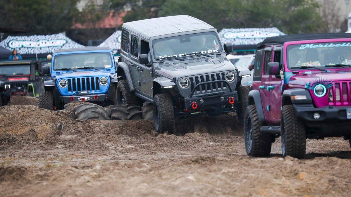 The 5th Annual Myrtle Beach Jeep Jam kicked into low gear Friday in Myrtle Beach as hundreds of Jeep lovers gathered at the old mall site to play in the mud on the “proving ground” obstacle course and check out each other’s classic and late model machines. The three day event runs from Oct. 28 through Oct. 30, 2022 with vendors, a daily sunrise beach drive, jeep shows, competitions and after hours entertainment. October 28, 2022.