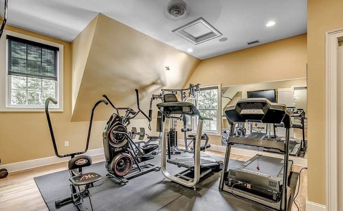 An expensive home is for sale in Pawleys Island, SC. The house is listed on Zillow for $2.9 million. It features a spacious outdoor area with a pool and cabana.