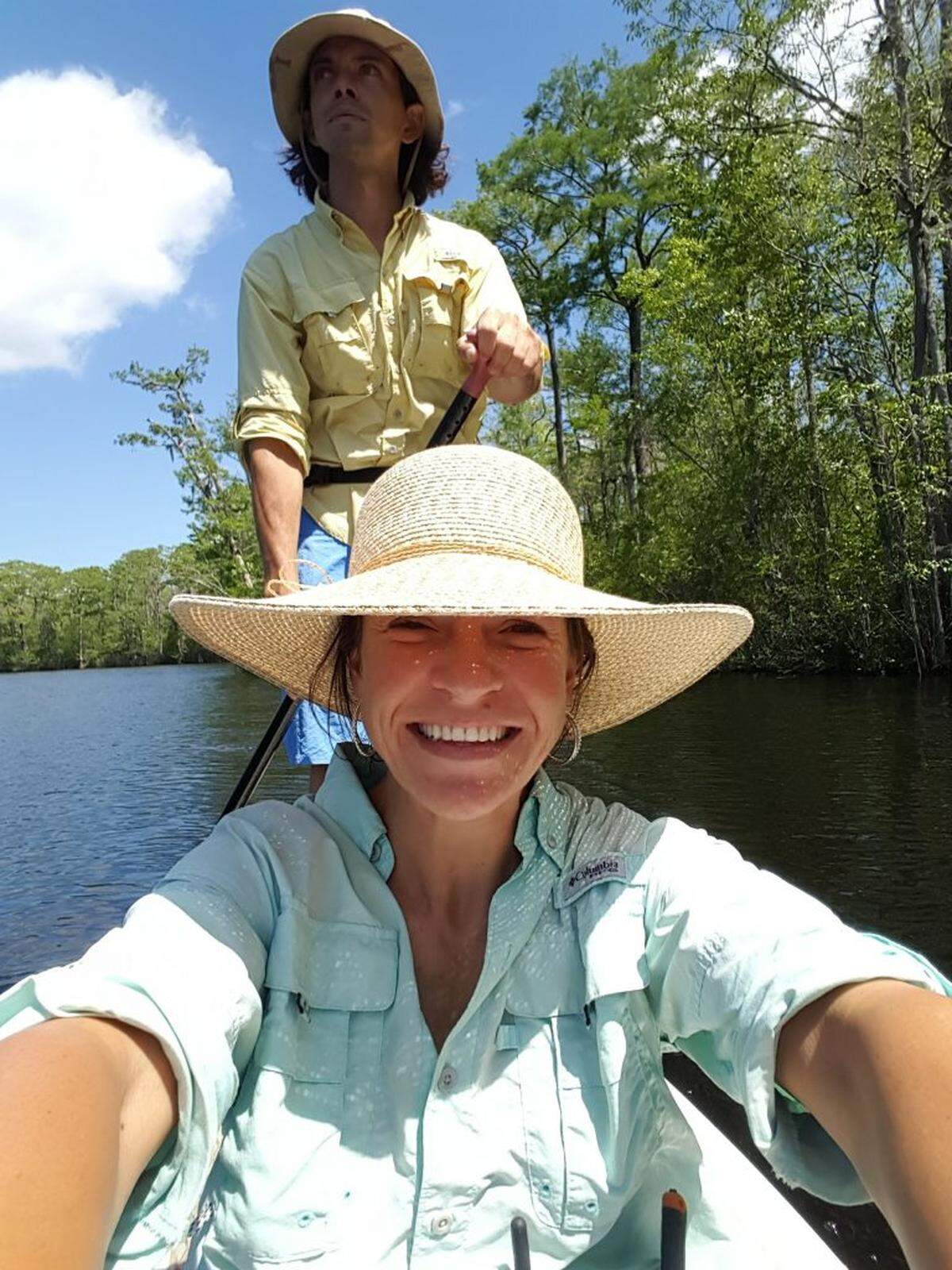 Trent Ventura and Meghan Douty, with The Carolina Waterman, paddle the Waccamaw.