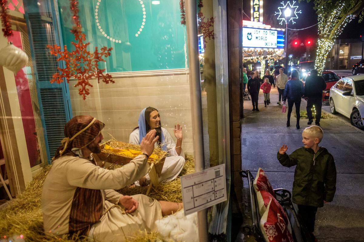 Conway S.C. held the annual “Living Window” displays amid holiday festivities that included camel and horse drawn carriage rides, and live entertainment Thursday night. The historic river town has become a holiday destination for locals and visitors. Dec. 9, 2021.