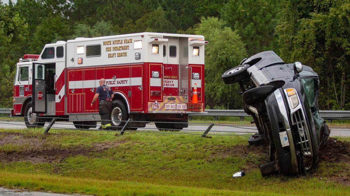 The North Myrtle Beach Fire Department responds to an overturned truck on northbound Hwy. 31 in North Myrtle Beach on Aug. 13.