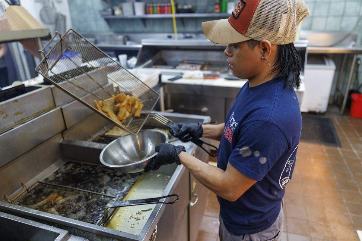 Calabash style seafood, which is lightly battered and fried, is prepared at Hooks Calabash Seafood Buffet, one of the more popular seafood buffets in the Myrtle Beach, SC area. Aug. 5, 2025.