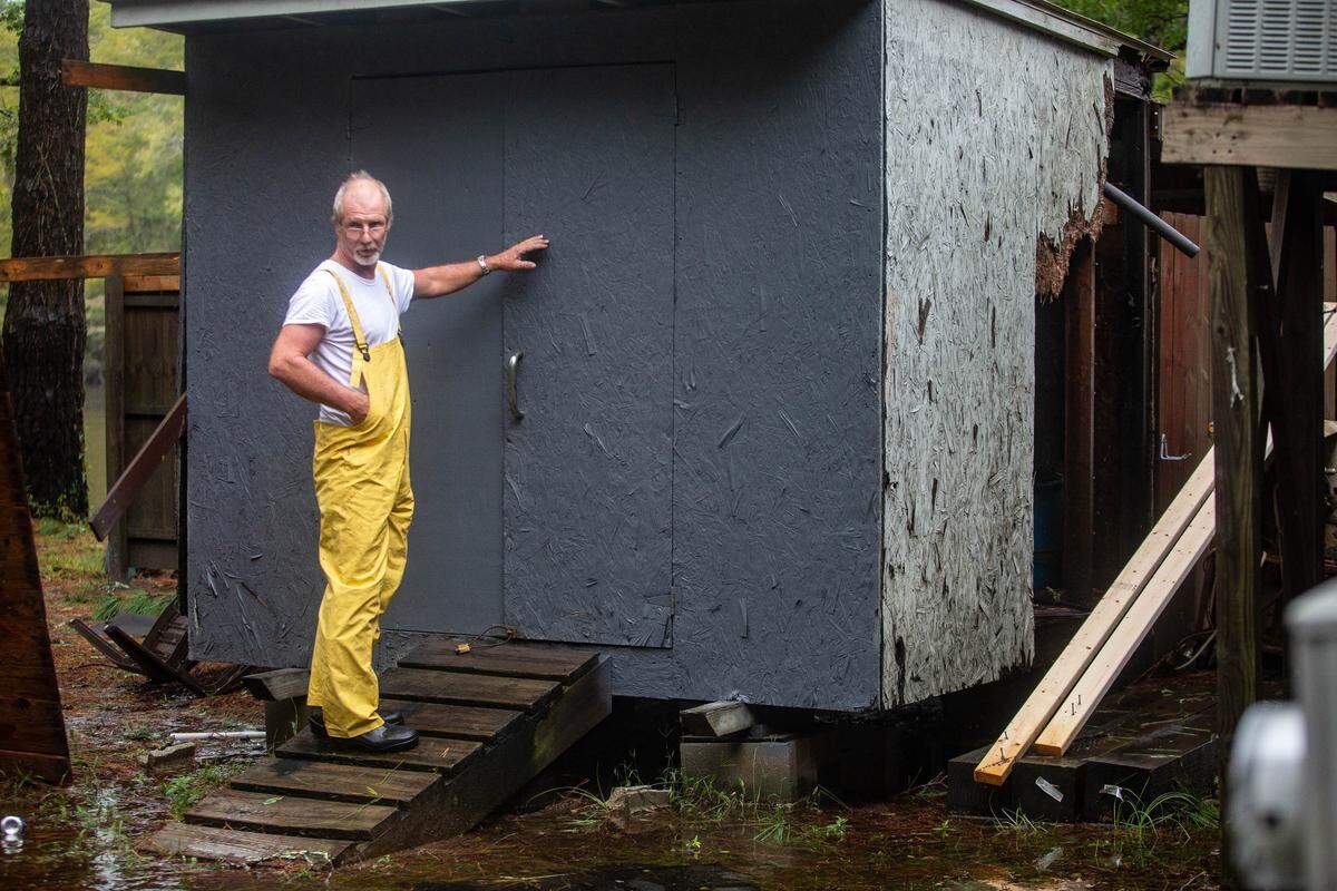 Conway resident Patrick Reynolds discusses the damage Hurricane Matthew did to properties along Waccamaw Drive in Conway.