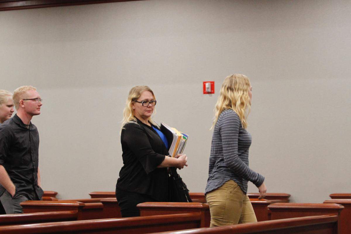 Tammy Moorer leaves the courtroom Monday, Oct. 8, 2018 for recess.