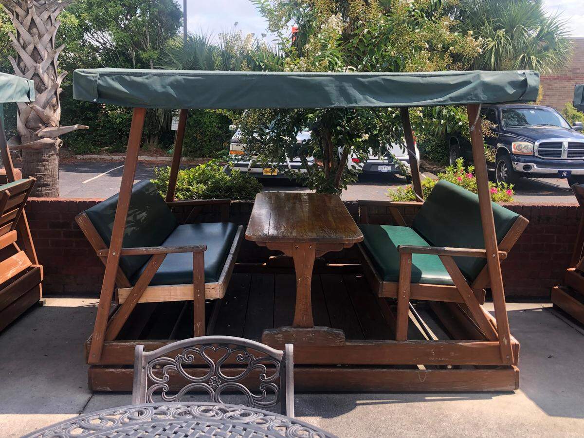 Dagwood’s Deli & Sports Bar opened on Tuesday, March 15, 2022 in North Myrtle Beach. It features rocking gliders with canopies on an outdoor patio.