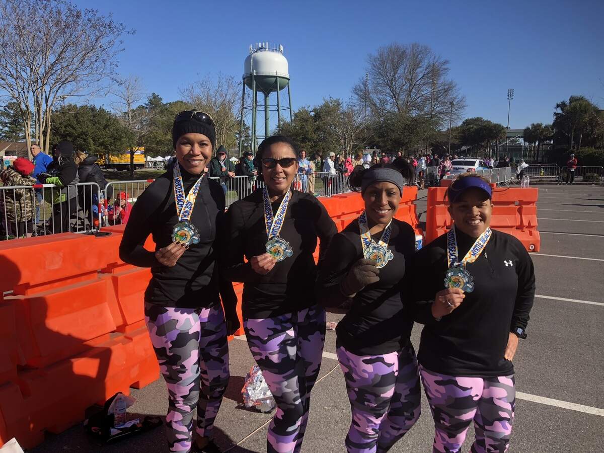 Lafayette, La., residents (left to right) Veronica Williams, Mandolia Jean Batiste, Toria Burrell and April Briscoe are attempting to run half marathons in all 50 states. The Myrtle Beach Marathon marked off their 17th state thus far.