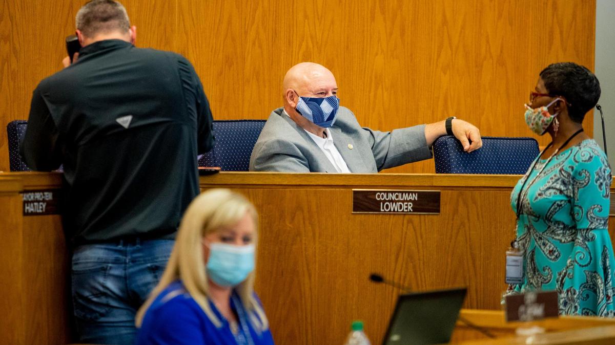 Myrtle Beach City Councilman Chuck Lowder takes his seat before a special meeting recently in Myrtle Beach. City Council approved a face mask policy prior to July 4th. Horry County has seen COVID-19 cases spike in recent weeks. The law will apply to retail, groceries & restaurants.