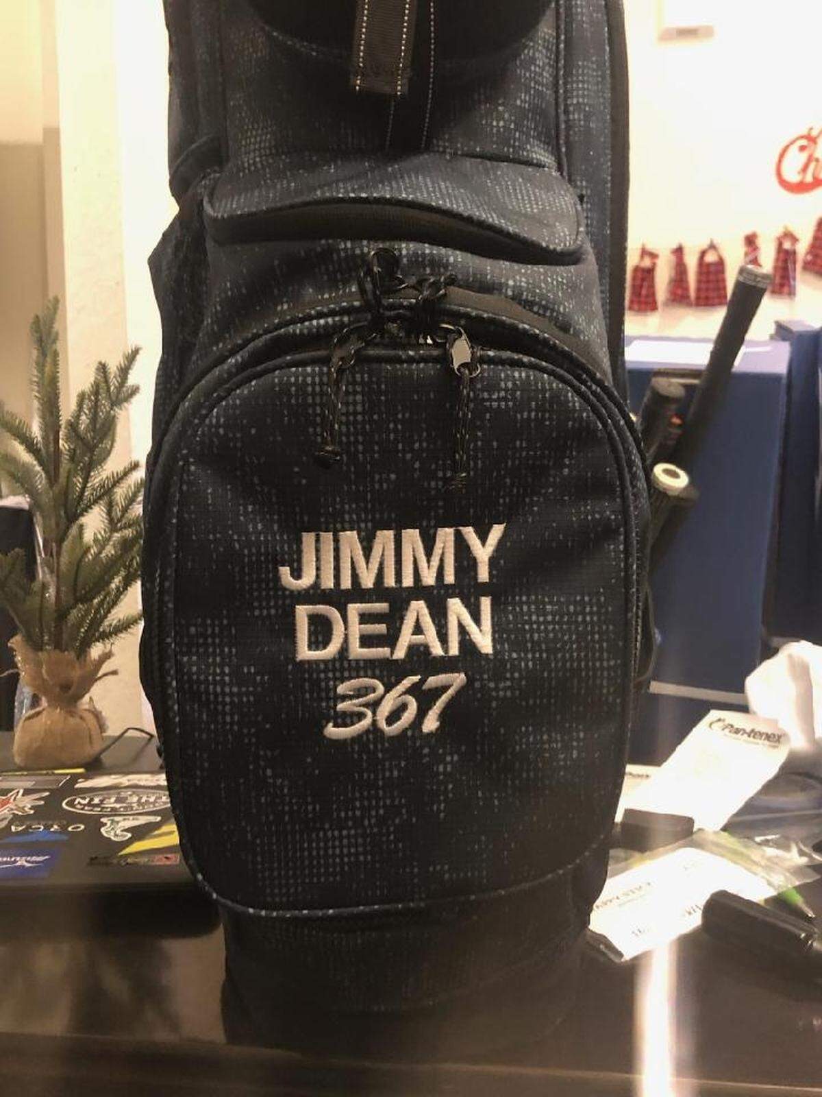 Jimmy Dean received a golf bag and set of clubs from other club members to commemorate reaching his goal of playing 367 rounds in 2020.