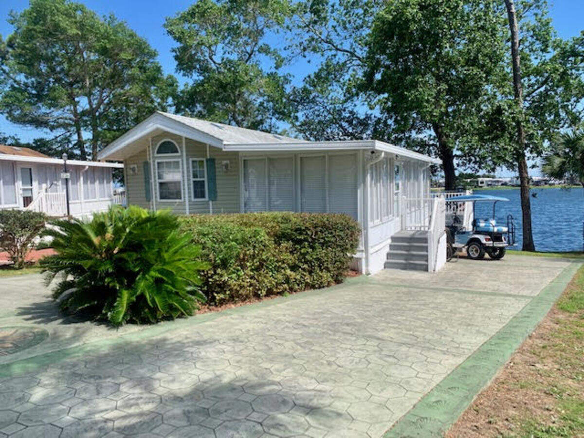 A home in the Myrtle Beach travel park sits quiet on Monday. Over the weekend human remains were found in the residence, police say.