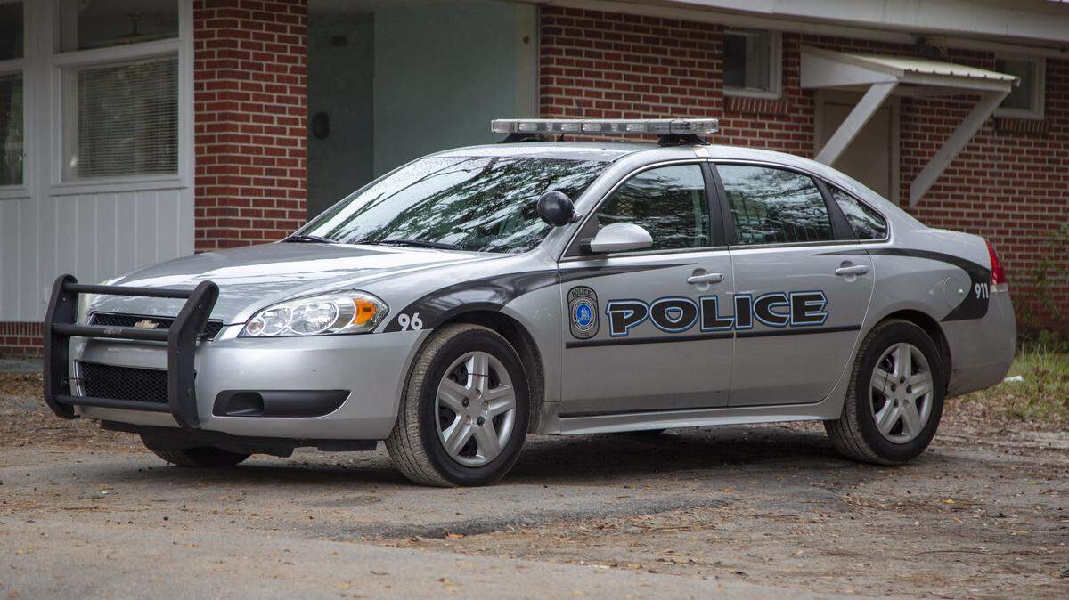 A Conway police cruiser sits parked at the Conway Police Department.