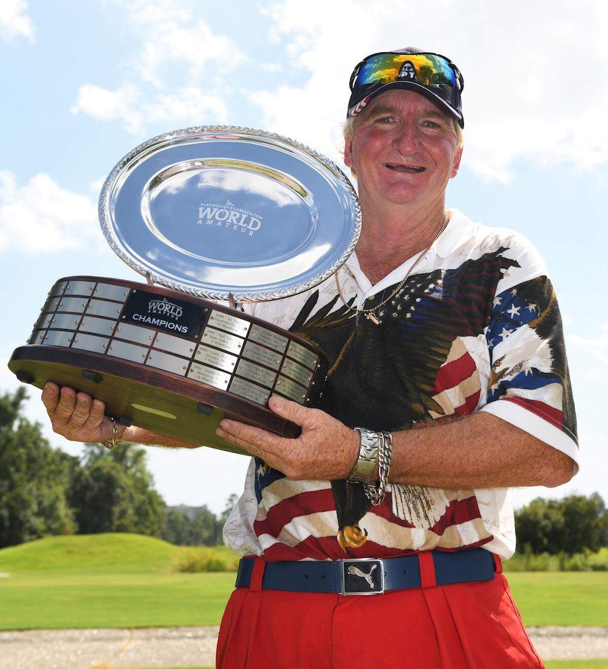 Harry Radley of Indianapolis holds the championship trophy of the 37th PlayGolfMyrtleBeach.com World Amateur Handicap Championship.
