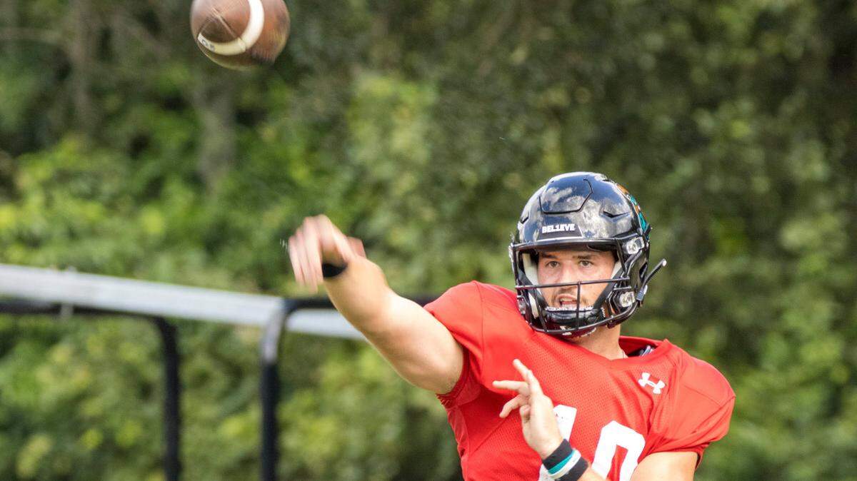 Coastal Carolina quarterback Grayson McCall runs through passing drills at Fowler Turf Field at Coastal Carolina University on Friday, August 26, 2022.