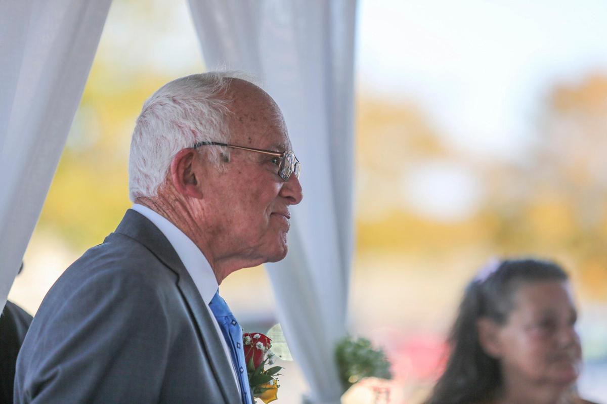 Jane Billedeaux and Harris Putnam, both 82-years-old, married Saturday in the parking lot of the Walmart where Billedeaux works as a host. Nov. 13, 2021.