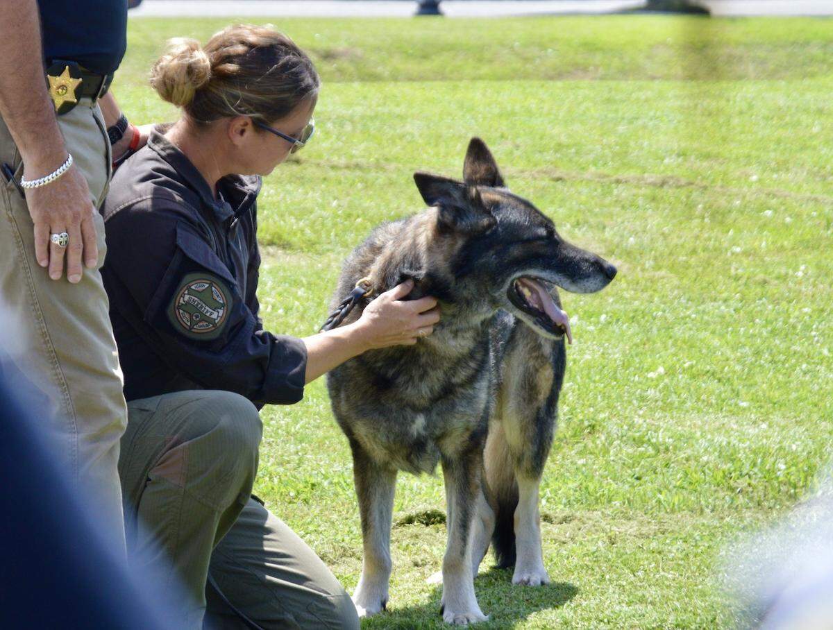 Officer Kane and Cpl. Misty Puckett before Kane’s escort