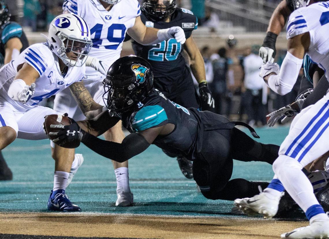 Coastal’s C.J. Marable gets into the end zone for CCU’s first touchdown in the first quarter. Coastal Carolina University, ranked #14, takes on #8 ranked Brigham Young University at Brooks Stadium in Conway, S.C. December 5, 2020.