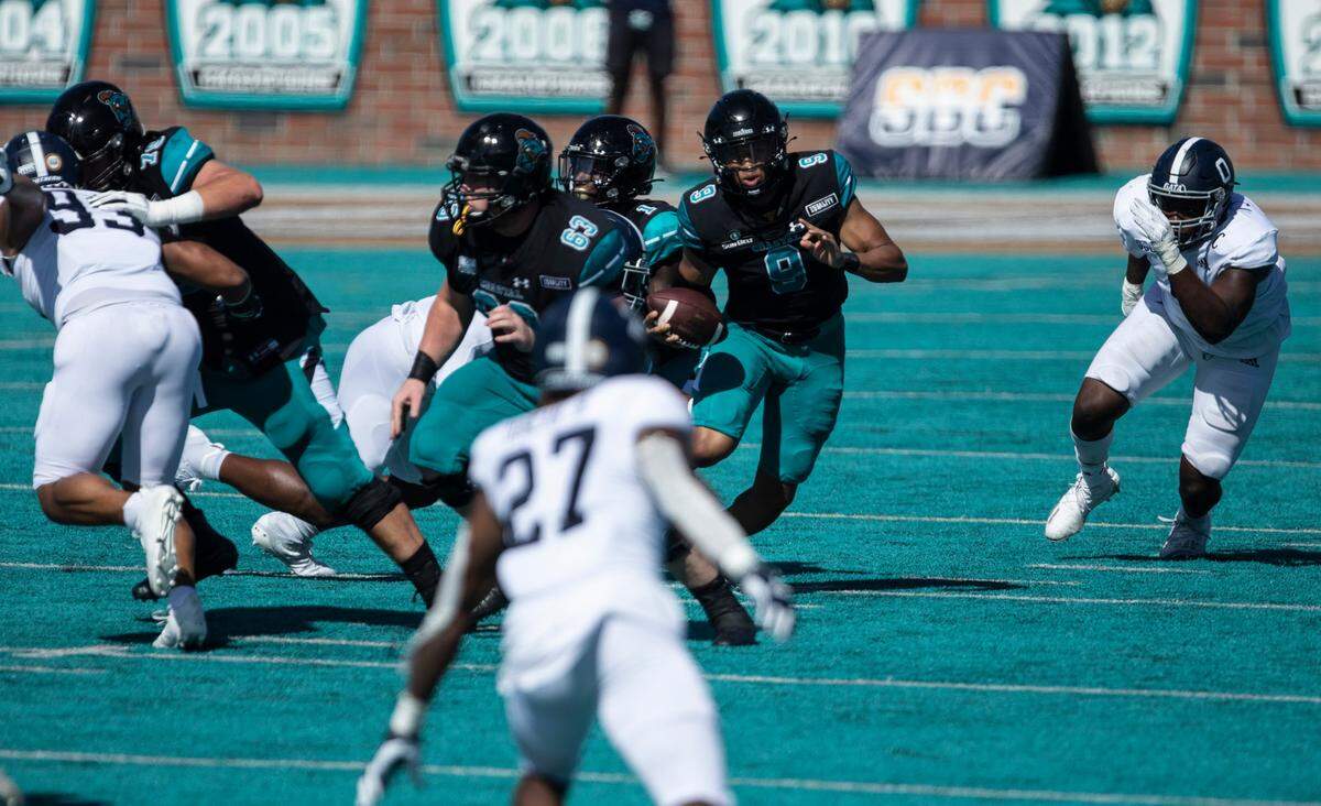 Coastal’s Fred Payton looks for rushing room against Georgia Southern’s defense. Coastal Carolina played its first game as a ranked FBS team against Georgia Southern on Saturday at Brooks Stadium in Conway. October 24, 2020.