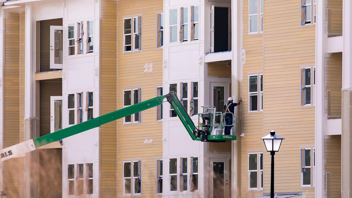 Contractors work on new apartments just off of International Drive at Mosby at Carolina Forest. New homes and apartments are being built across Horry County to accommodate an expected 500,000 thousands residents by the year 2040. Apr 28, 2019.