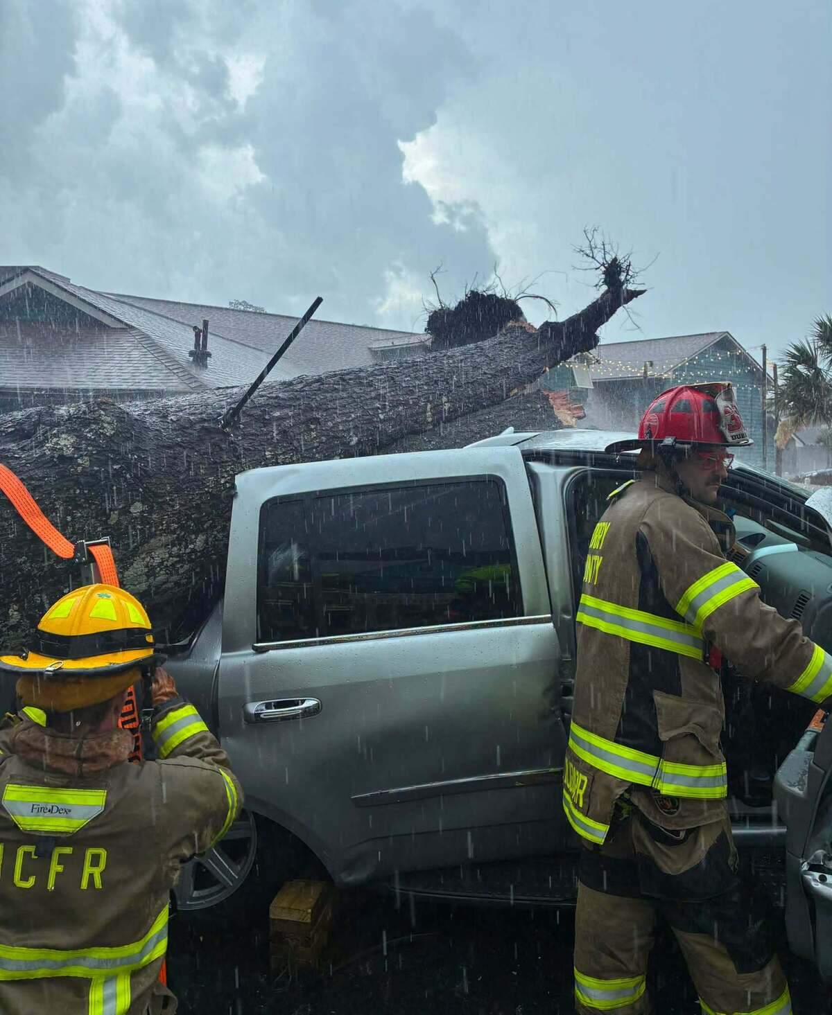 Horry County Fire Rescue crews responded to a Myrtle Beach area business Tuesday, July 7, 2026, where a large tree fell onto a vehicle, trapping a driver inside.