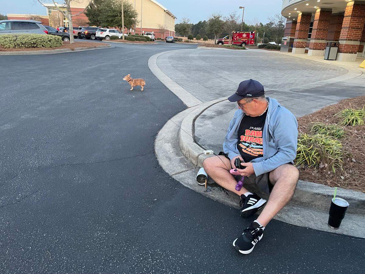 Michael Schutz evacuated his home and went to the Carolina Forest Recreational Center after wildfires raged through the neighborhoods of Walkers Woods and Avalon. Firefighters have been battling the fires in several areas of Horry County since Saturday afternoon. March 1, 2025