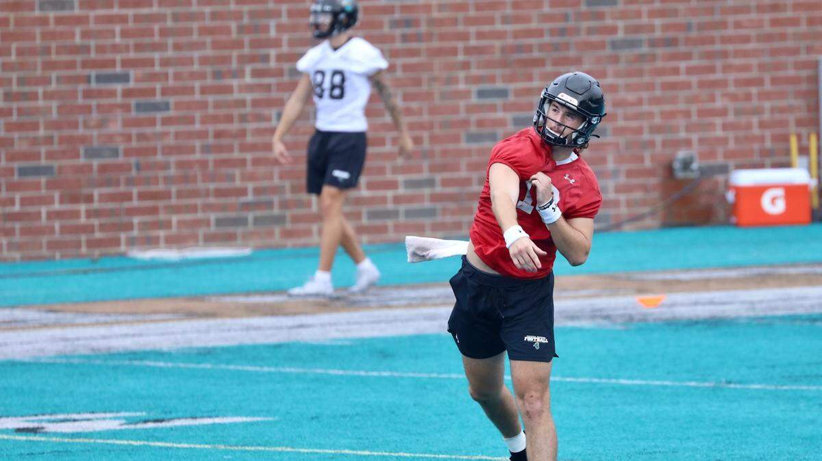 Coastal Carolina football quarterback Grayson McCall throws a pass Wednesday. The Chanticleers held their first fall camp practice of the 2021 season on Wednesday at Brooks Stadium in Conway.